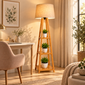 Arden wooden tripod floor lamp styled beside an elegant home office desk