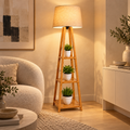 Arden wooden tripod floor lamp styled in a warm contemporary living room