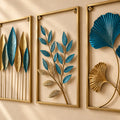 Close view of teal leaves, antique-gold finish and metal frame details
