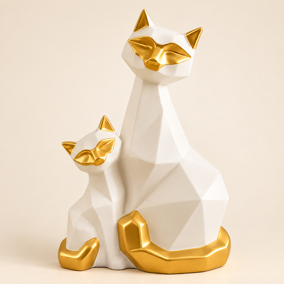 White and gold geometric porcelain cat duo figurine on an ivory background