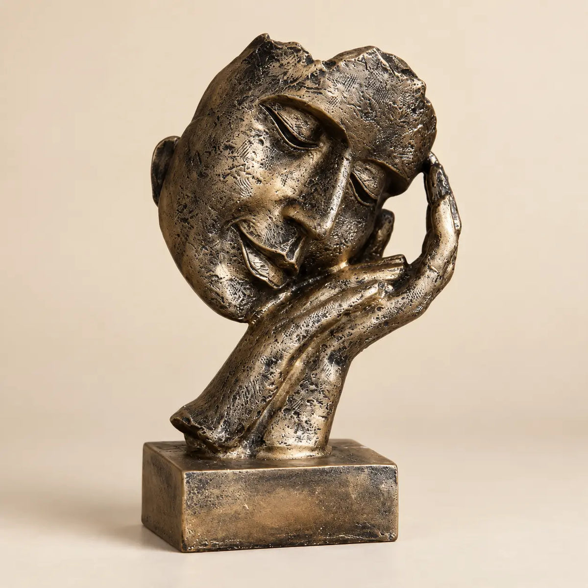 Three-quarter view of the Golden Serenity resin sculpture and textured finish