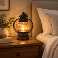 VIRAAM Heritage Glow table lamp beside neutral bedding