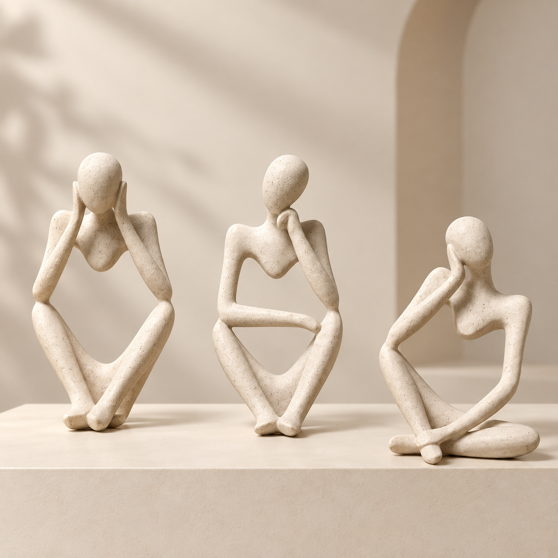 The Quiet Thinkers cream abstract figurine set of three