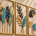 Close view of turquoise, black and antique-gold metal leaf details