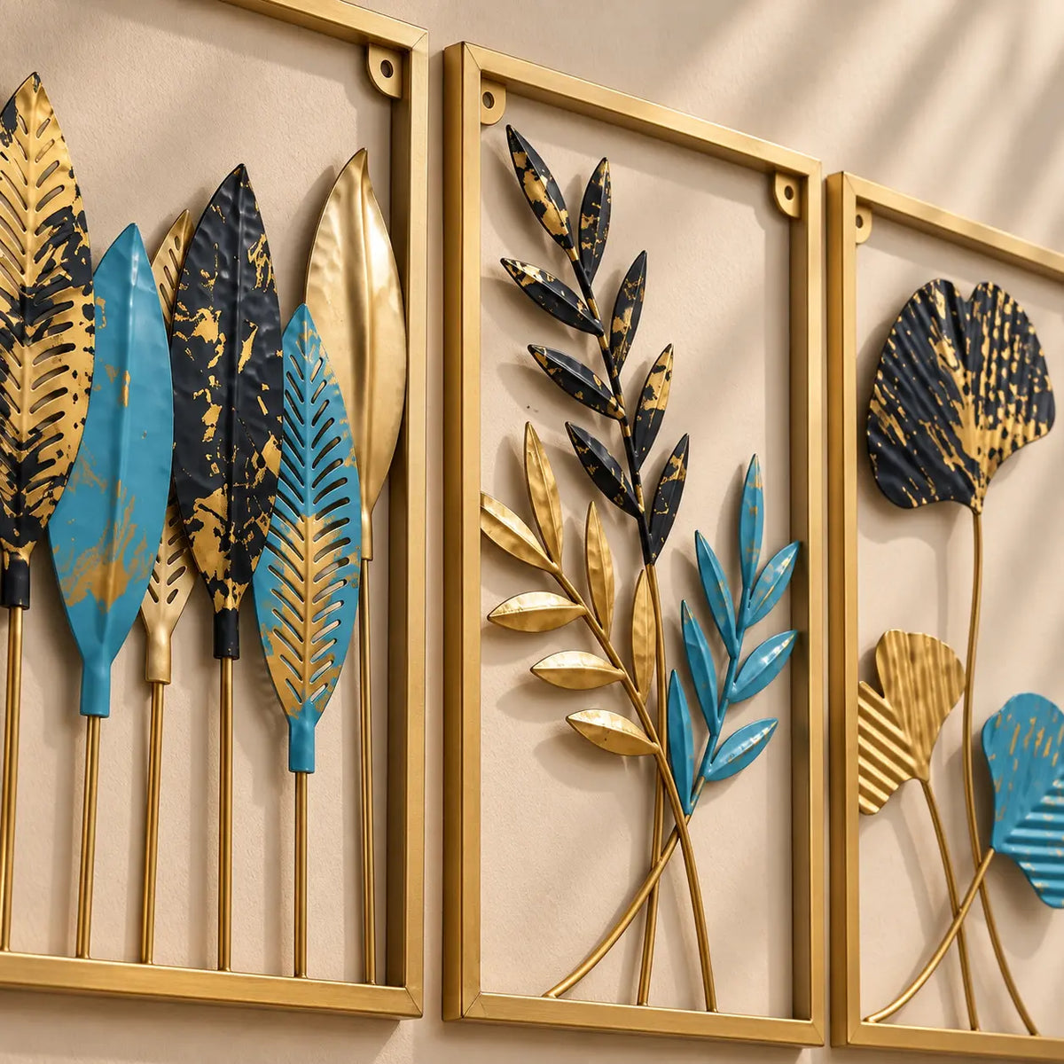 Close view of turquoise, black and antique-gold metal leaf details
